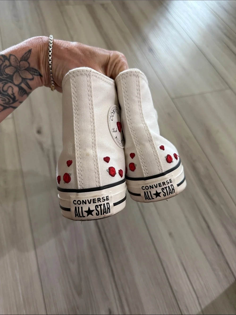 White High-Top Converse Sneakers with Red Heart Accents
